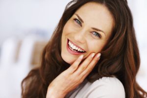 Smiling Beautiful Brunette with Green Eyes